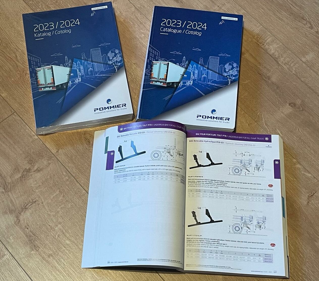 Publiland, gestion de projet, BAT, catalogue multilingue, photographie produit, retouche photo, schémas techniques, conseil impression, PDF, feuilletage en ligne, transparence, communication visuelle